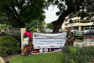 Augustina Owusu and Veneeta Dayal in front of a ALS 7 banner