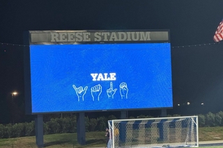 sign language on soccer screen